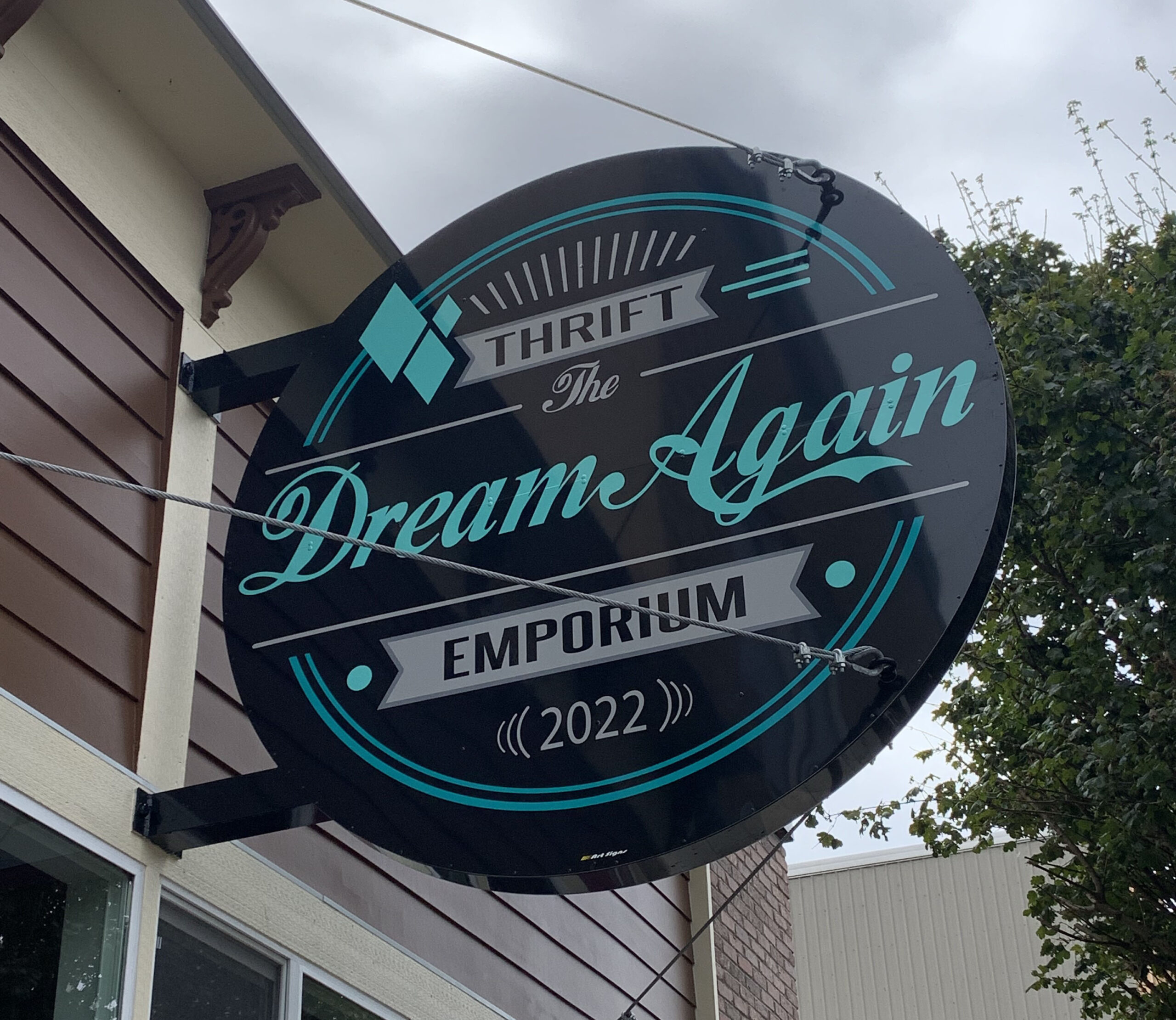 Dream Again Thrift Emporium Sign